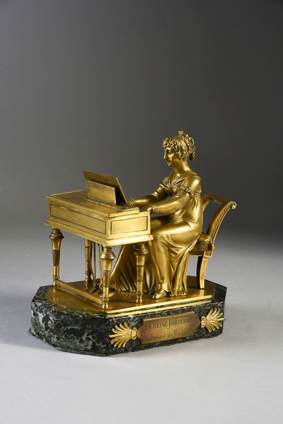 École Française du XIXe siècle La reine Hortense jouant au piano.
Personnage en bronze...