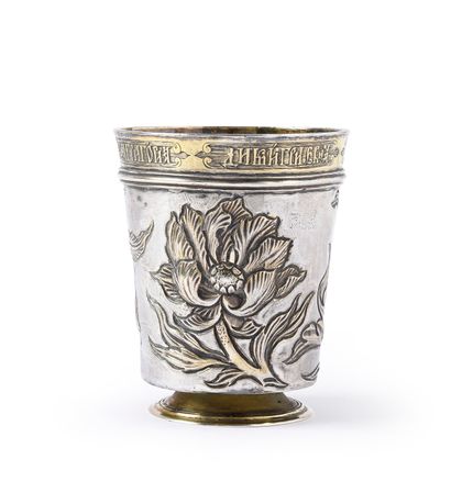 null SILVER AND VERMEIL TIMBALE. Of flared form, resting on a pedestal base, decorated...