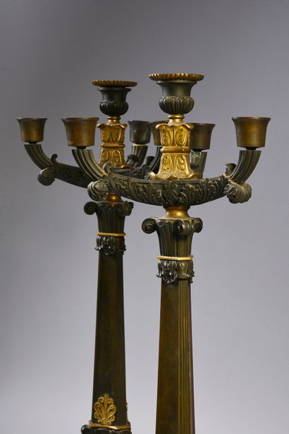 null PAIR OF LARGE CANDELABRA. With four arms of light in green patina bronze in...