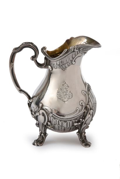 null SILVER SERVICE,.
FRAY-HARLEUX, PARIS, XIXth CENTURY.
Composed of a teapot, a...