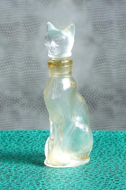 ROWSKY «Fleurisette» - (années 1920) Rare flacon en verre incolore pressé moulé dépoli...