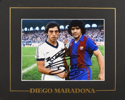 null 
Diego Maradona et Alain Giresse. Photo autographiée par Maradona sous le maillot...