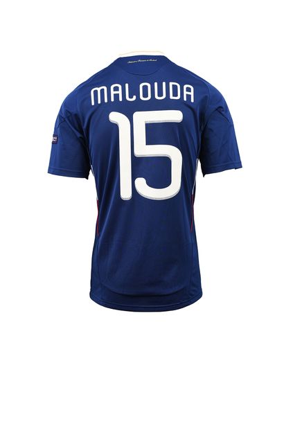 null Florent Malouda. Midfielder. Jersey No. 15 of the French team for the qualifying...