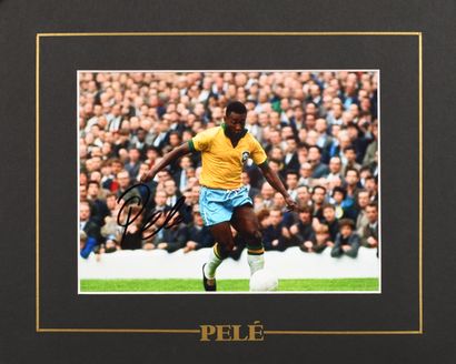 Pele. Photo autographed by the player under...