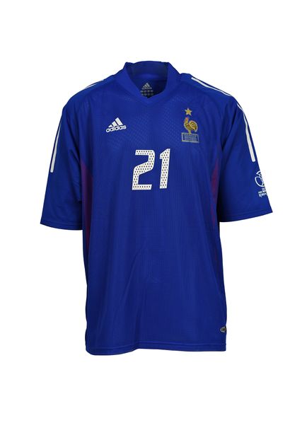 null Christophe Dugarry. Attacker. Jersey N°21 of the French team for the 1st match...