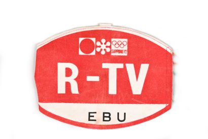 null Sapporo 1972. Brassard officiel TV.
Dimensions 14x18 cm.
Official TV. Armband....