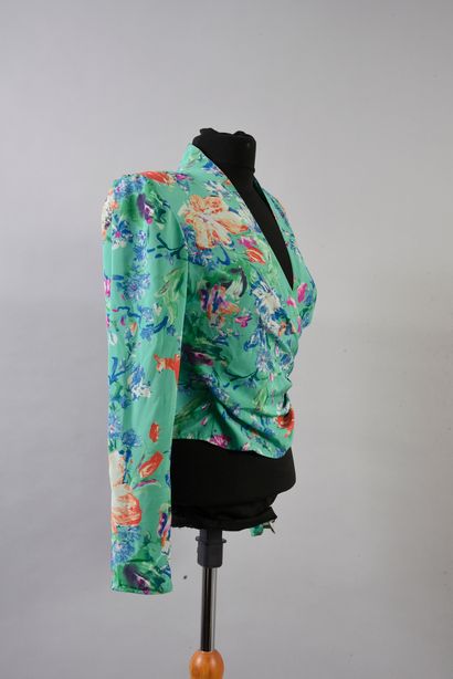 UNGARO PARRALELE 
Printed silk blouse with long sleeves draped over the waist. We...