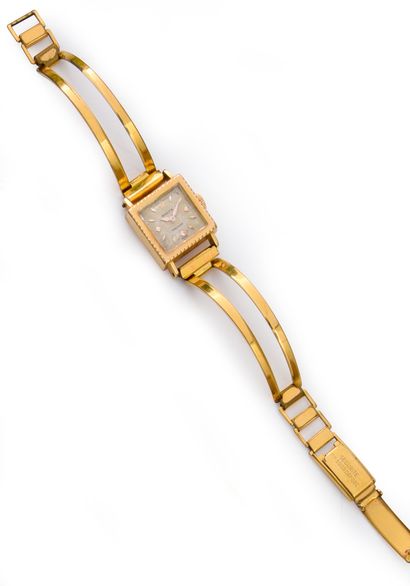 ROLEX Square ladies' watch in gold 750e, the rigid bracelet in gold plated.
Gross...