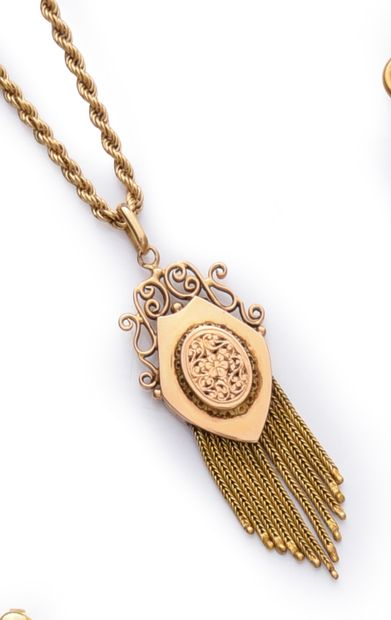 Pendant in gold 750e, with guilloche decoration...