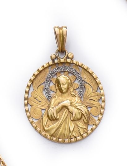 Médaille en or 750e, ornée d'une figure de...