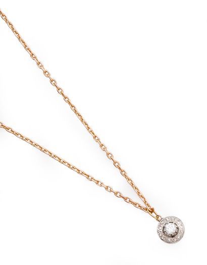 null Gold necklace 750e, with a two-tone gold pendant set with a half-size diamond...