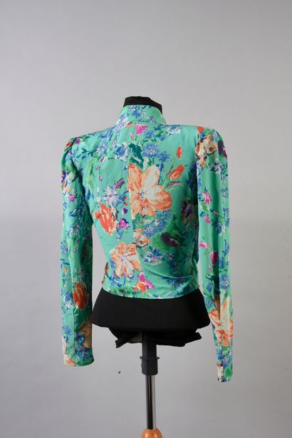 UNGARO PARRALELE 
Printed silk blouse with long sleeves draped over the waist. We...