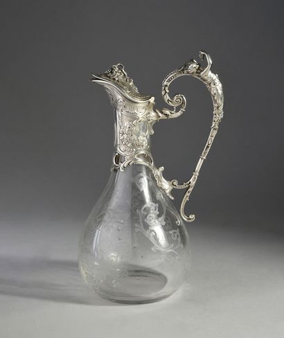 null Carafe out of engraved crystal with decoration of vine, the mount out of silver...