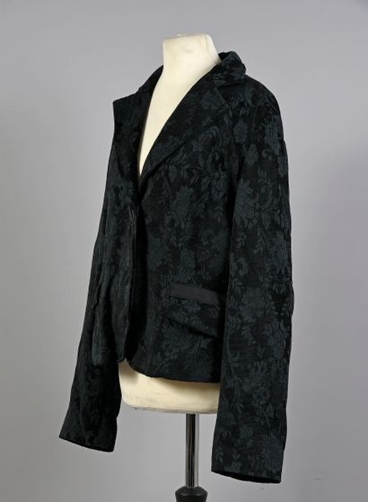 Louis FERAUD Robe Louis Féraud blanche avec des losanges noirs, le bas de la robe...