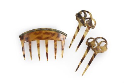null Set of 3 hair combs imitating tortoiseshell, 2 of which are similar stylizing...