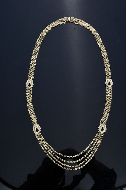 null Long necklace in gold 750e with four rows of chains with links in shuttle, decorated...