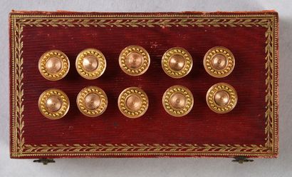 null Set of 10 small gold shirt buttons with concentric circles and a frieze of pearls.
D....