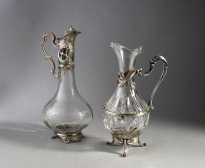 Set of three glass and crystal decanters...