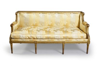 null Sofa of wood carved and gilded, carved back of friezes of piastres with clasp...