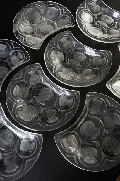 Marc LALIQUE (1900 - 1977). D'après Set of 18 pressed molded glass salad plates,...