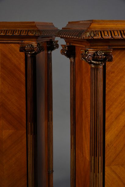 null Pair of walnut veneered sheaths, each corner decorated with a detached Ionian...