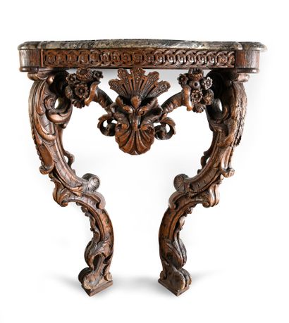 Carved wood console, the openwork belt decorated...