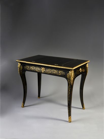 Reading table in marquetry of Boulle type.
Decorated...