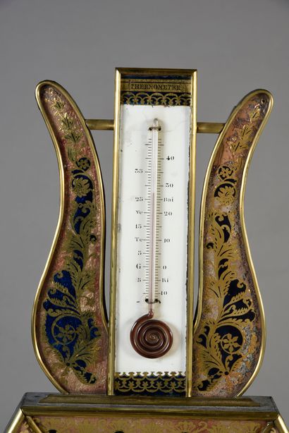 null Barometer-thermometer in eglomerate glass.
Hexagonal in shape, it is decorated...