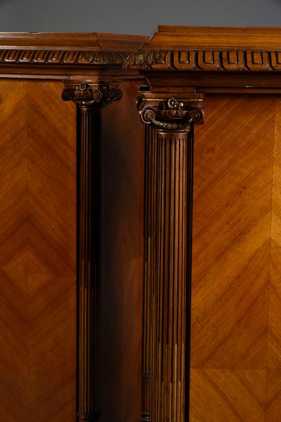 null Pair of walnut veneered sheaths, each corner decorated with a detached Ionian...