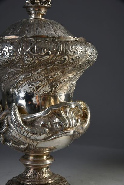 null Important covered vase in chased and engraved silver. Pedestal decorated with...