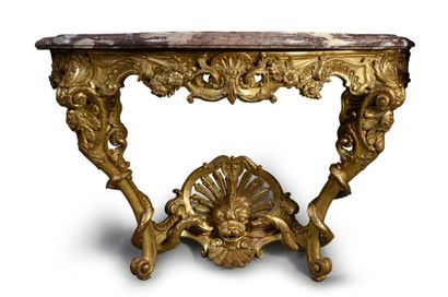 Carved and gilded wood console, the belt...