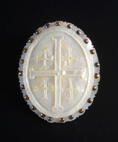 null Set of two engraved mother-of-pearl medallions, one of which is mounted on a...