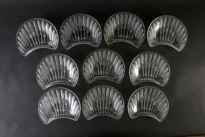 Marc LALIQUE (1900 - 1977). D'après Set of 18 pressed molded glass salad plates,...