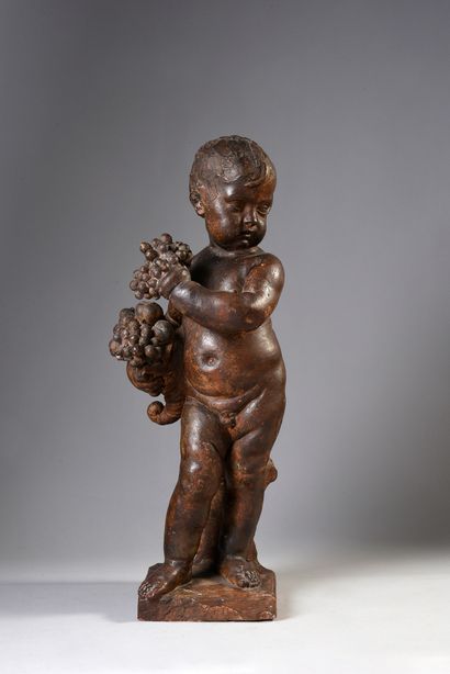 Child in patinated terra cotta. Standing,...