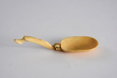 null Rare carved ivory spoon with folding handle, hoof-shaped tip.
Beginning of the...