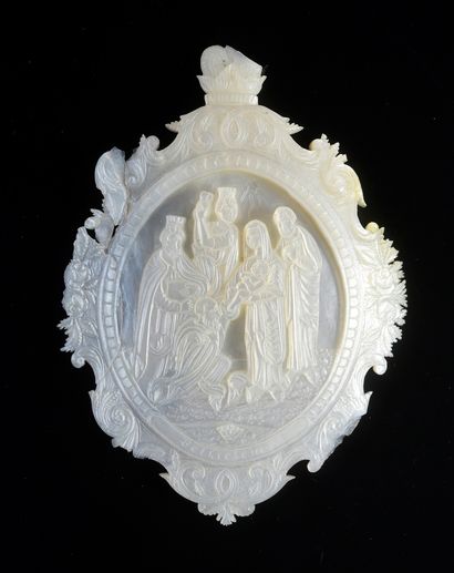 null Set consisting of a mother-of-pearl plaque carved in high relief representing...