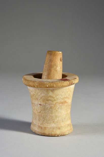 null Lot composed of a truncated cone-shaped ointment vase with flat lip and an alabaster....