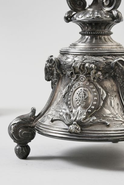 null A pair of silver candelabras 925e, with three arms and four lights, resting...
