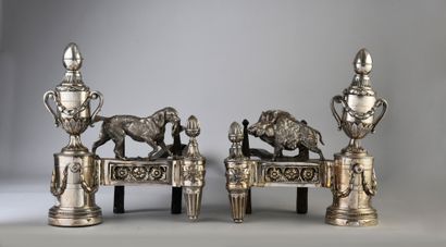null Pair of silvered bronze andirons, decorated with vases covered on a half column...