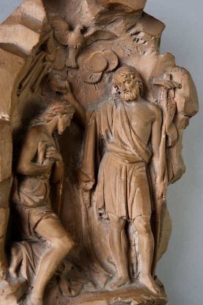 null Terracotta stoup representing on the backsplash the Baptism of Christ by St....