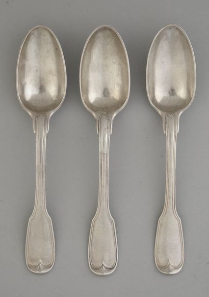 null Lot composed of three silver spoons net model, the spatula engraved with a coat...