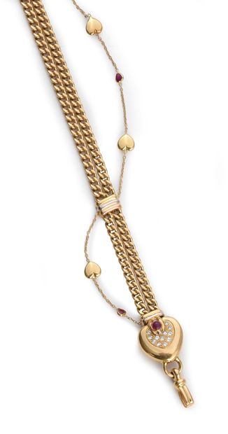 null Gold bracelet 750e, with double chain gourmette pattern adorned with a chain...