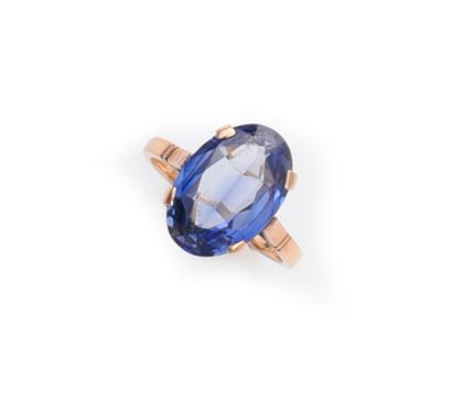 null Lot in gold 750e (18k), composed of 2 rings decorated with a blue stone of imitation....