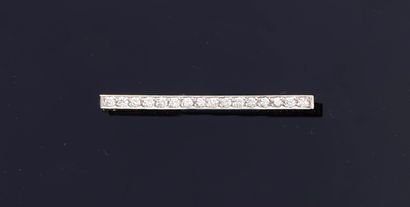 null Ensemble en or 750e (18k) rhodié, composé d'un bracelet jonc ouvrant et d'une...