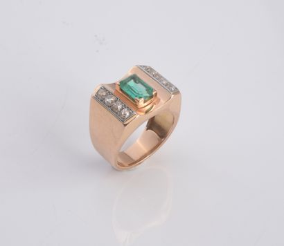 MAUBOUSSIN att à. 18k gold tank ring set with a beautiful rectangular cut emerald...
