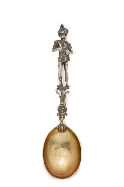 null Silver spoon in Renaissance style, the handle composed of a scroll and leaves,...