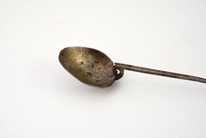null Silver spoon with long tapered handle, the bracket engraved with a cross.
Probably...