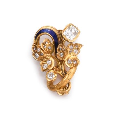 18k gold brooch with a leafy branch set with...