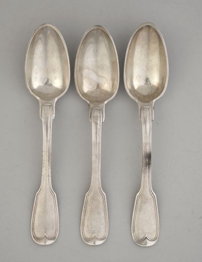 null Lot composed of three silver spoons net model, the spatula engraved with ecclesiastical...