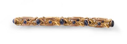 null Gold bracelet 585th (14k) with foliage scrolls articulated set with oval cabochons...